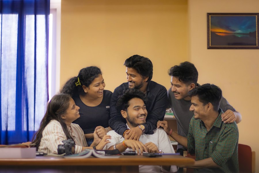 Students chatting in a hostel room